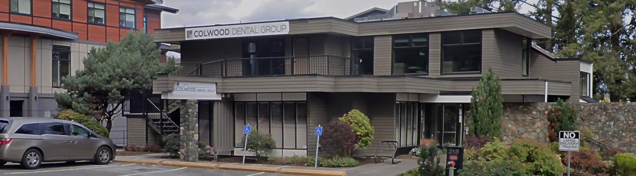 Person holding dental model